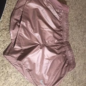 Rose gold Nike running shorts